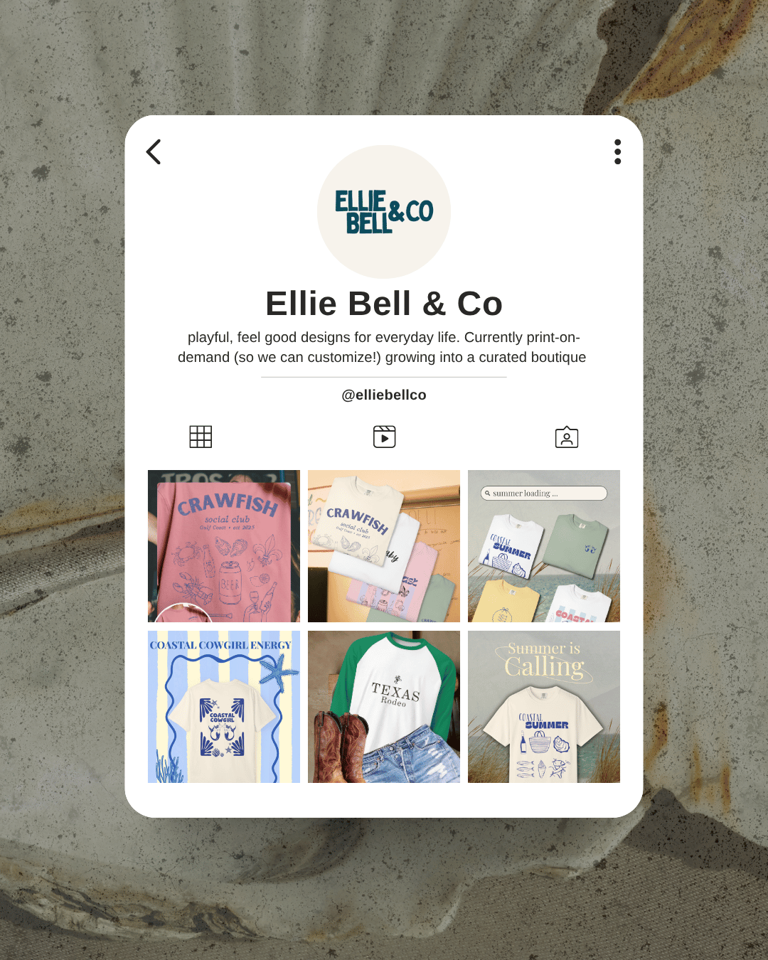 Product display of Ellie Bell & Co on a smartphone screen with a concrete background